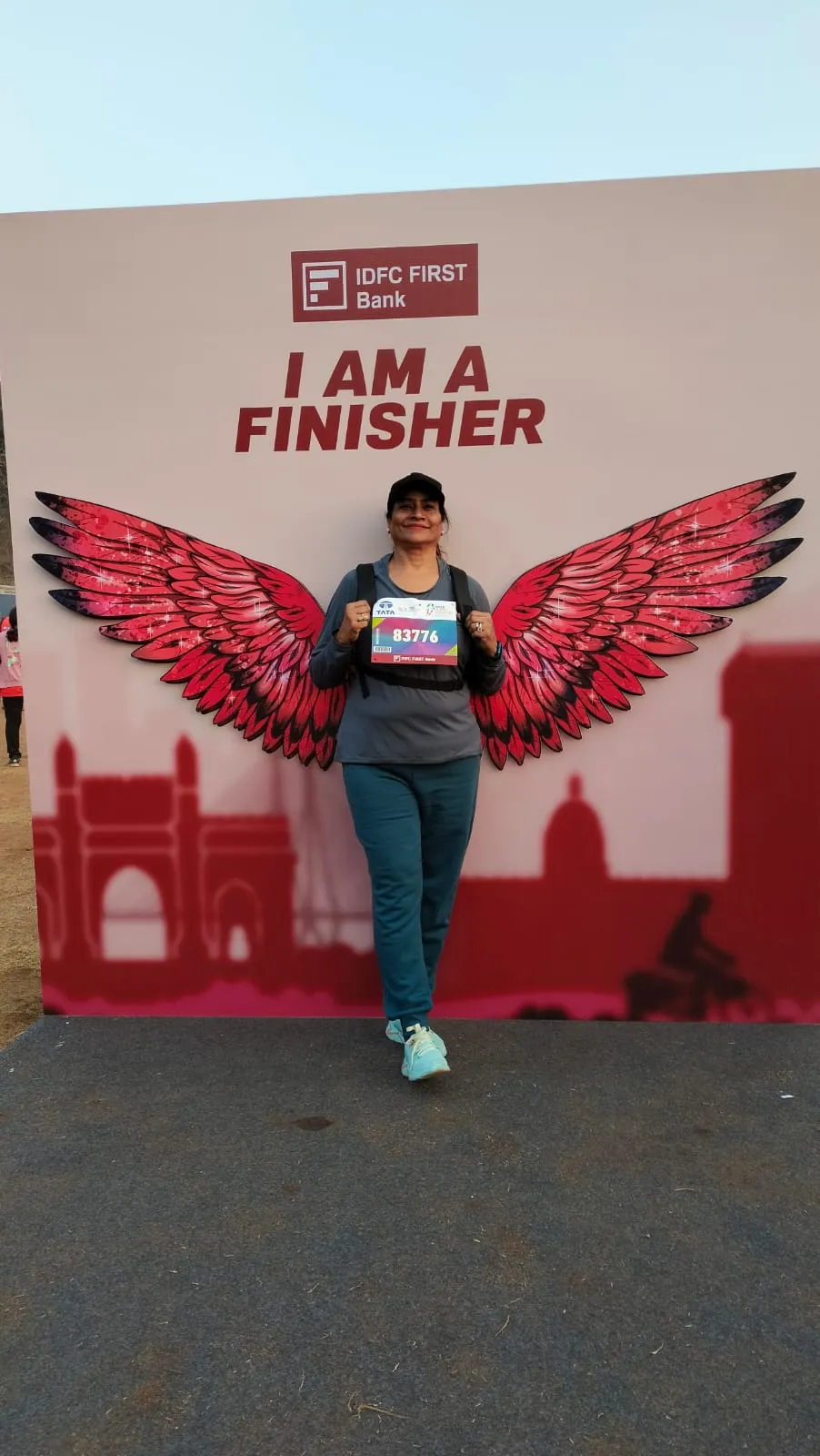 Dr. Fehmida Shaikh at marathon finish line photo opportunity