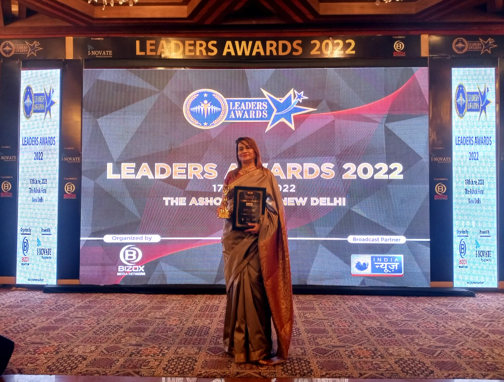 Dr. Fehmida Shaikh honored on stage with giant LED backdrop at Leaders Awards 2022